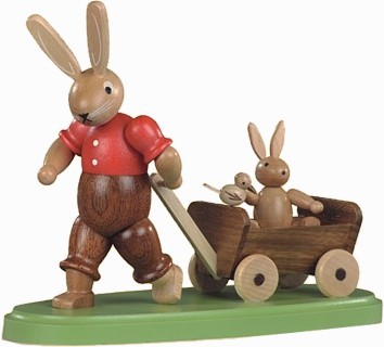 Kleinkunst Müller Hasenvater mit Kind auf Bollerwagen