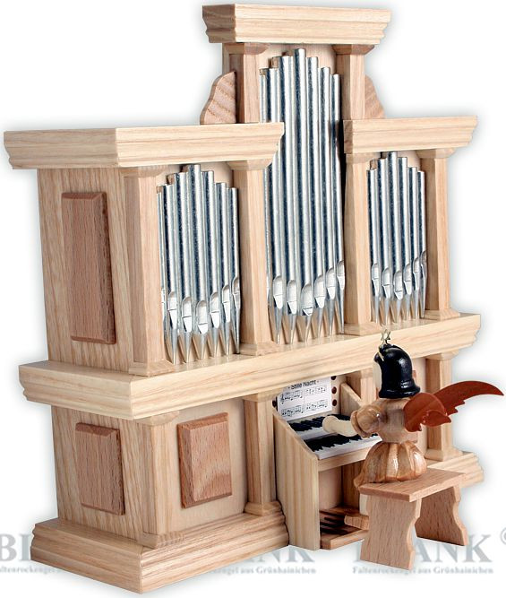 Blank Kurzrockengel an der Orgel, mit Spielwerk