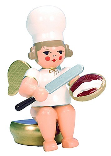 Baker angel, sitting with a range Baker angel, sitting with a range