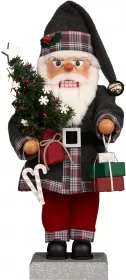 Christian Ulbricht Nussknacker Weihnachtsmann Geschenkeübergabe